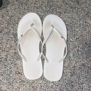 White hollister rubber flip flops